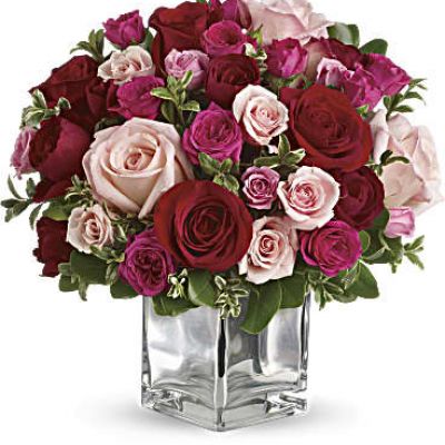 Sing them a love song - with flowers. This lush, loving rose arrangement tells them just how much you care.